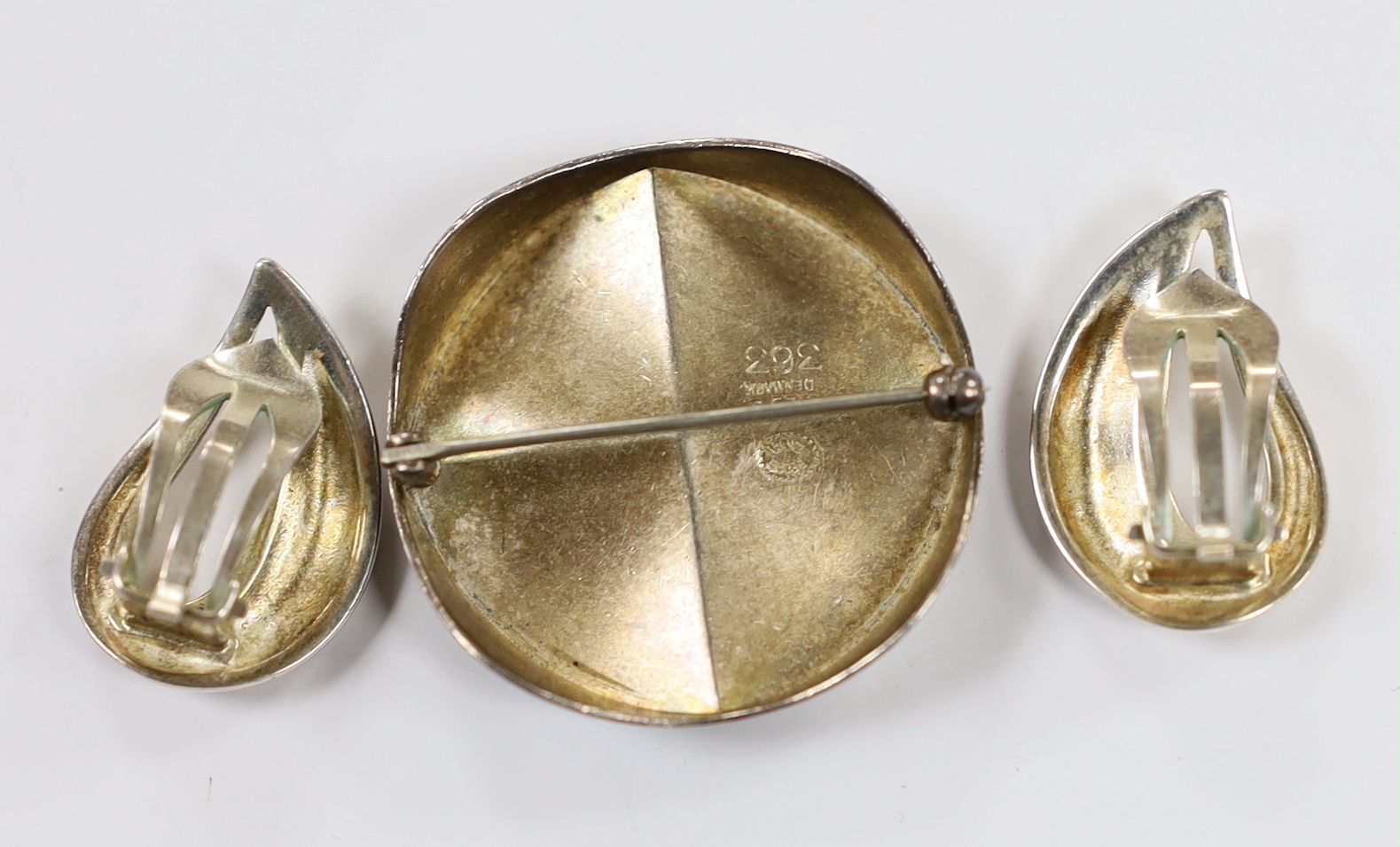 A modern pair of Georg Jensen silver ear clips, 24mm and a Georg Jensen sterling brooch, design no. 363